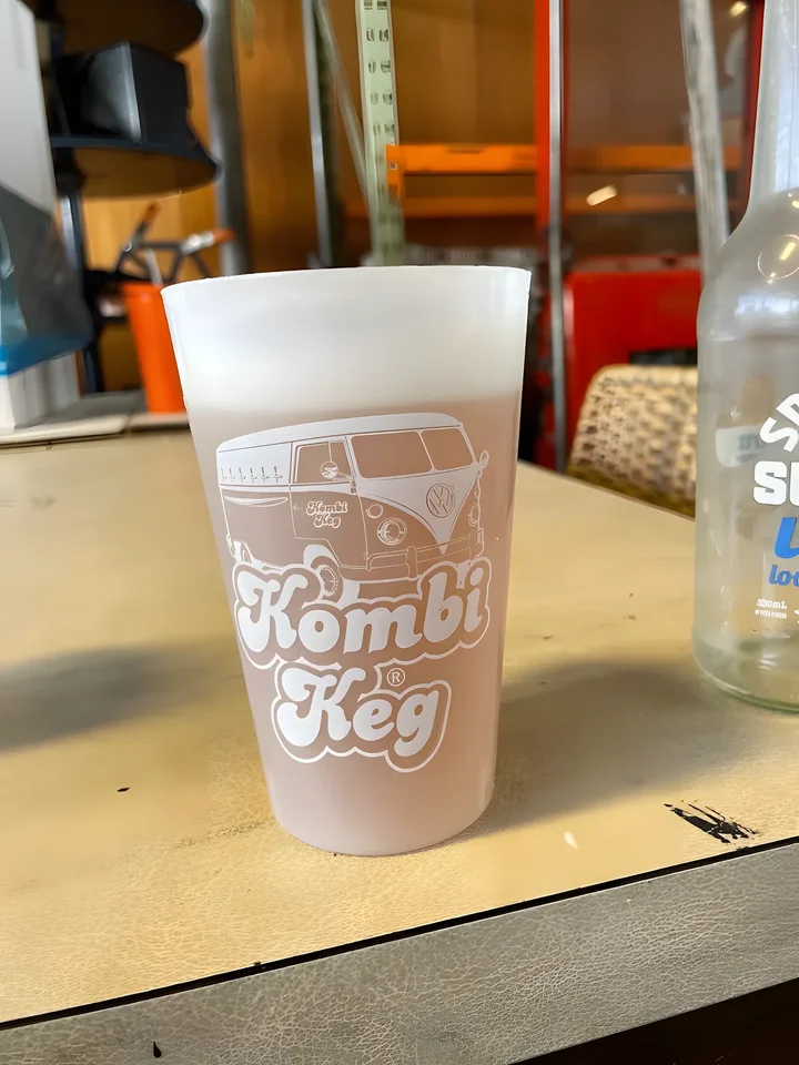 Reusable event cup printed with Kombi Keg van artwork