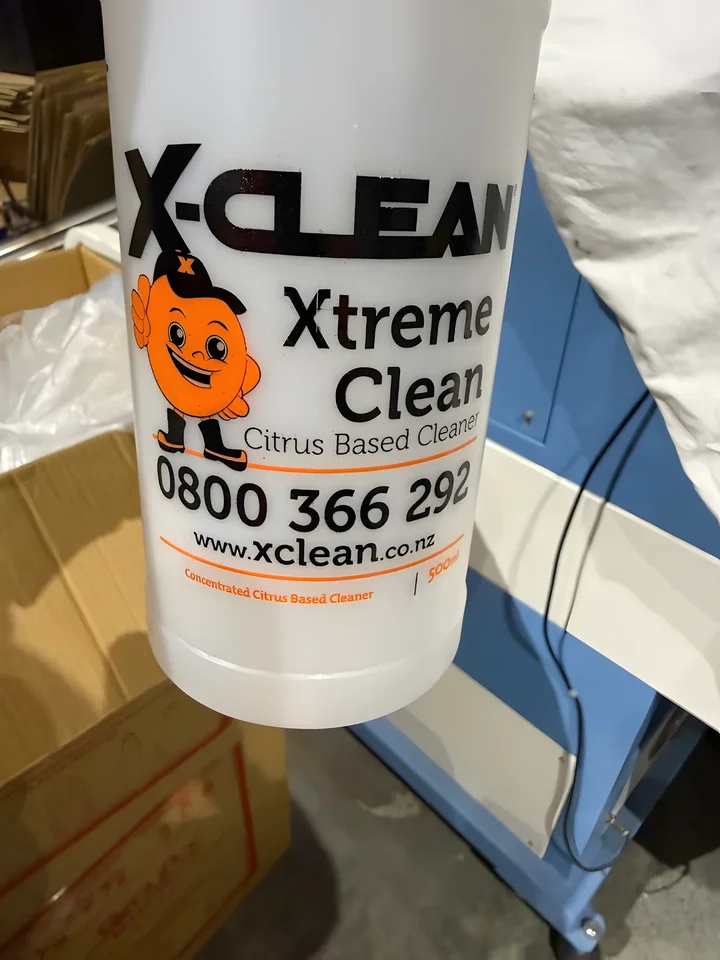 X-Clean bottle printed in three colours